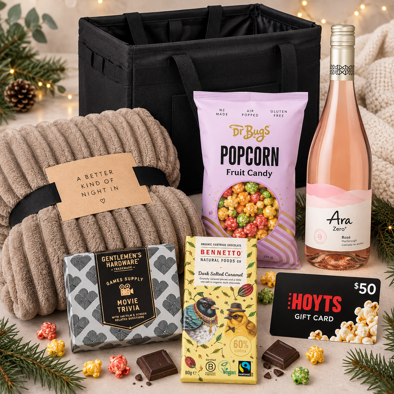 The Big Night In complete gift-set contents: Nieve blanket, Dr Bugs fruit candy popcorn, Gentlemen's Hardware movie trivia, Bennetto dark salted caramel, Ara Zero rosé and HOYTS $50 gift card with the Form organiser