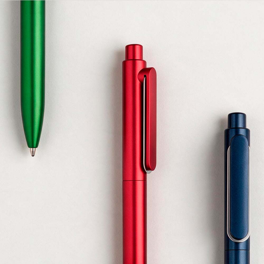 Christie Pen rABS styled in green, red and navy blue