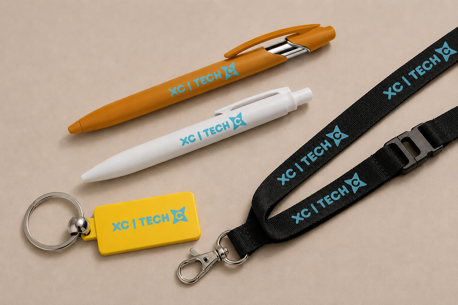 Branded pens, keyring and lanyard each decorated with a matching blue logo using pad printing